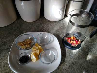 Mint-Hibiscus-Rosehip tea - Adding the rose hips